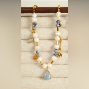 Gold and White Pearl Necklace with Blue Accents